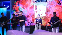 a group of people on stage at an event
