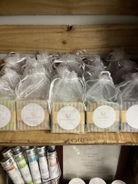 a wooden box filled with soaps and other items
