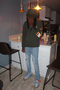 a person standing in a kitchen