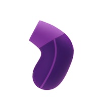 a purple sex toy on a white background