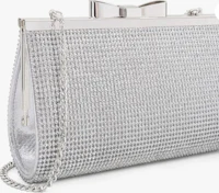 a silver evening bag with a chain and bow