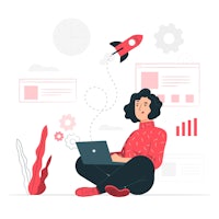 a woman sitting on the floor with a laptop and a rocket