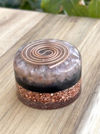 a glass container with a spiral on top of it