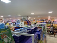 the inside of a toy store with lots of toys