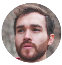 a man with a beard and a red hoodie