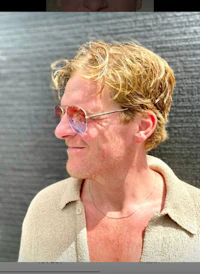 a man wearing sunglasses and a t-shirt