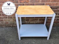 a side table with the words galaxy chic on it
