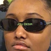 a woman wearing sunglasses with the word joli desir on them