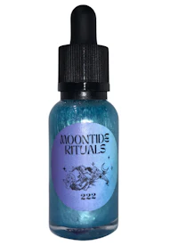 a bottle of moonstone rituals with a blue and black label
