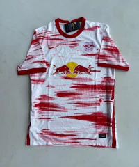 a red bull soccer jersey with a red bull on it