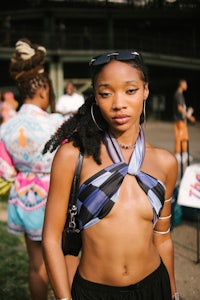 a woman in a bikini posing for a photo