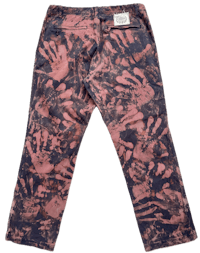 a pair of pants with hand prints on them