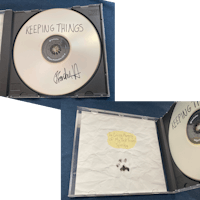 a cd with a picture of a dog and a cd with a picture of a dog