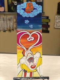 a painting of a cartoon character with a heart on it