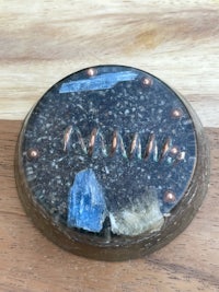 a piece of wood with a piece of metal on it