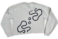a white sweatshirt with a black design on it