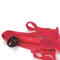 a red lingerie set with a sex toy