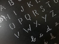 a blackboard with letters written on it