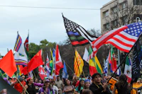 a group of people holding flags