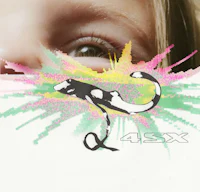 a girl's eye is peeking out of a piece of paper