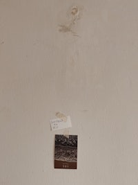 a piece of paper on the wall of a room