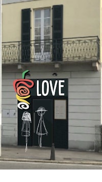a drawing of a building with the word love on it