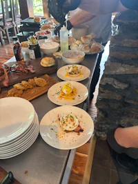 a table full of plates with food on them