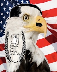 an eagle with an american flag in front of it