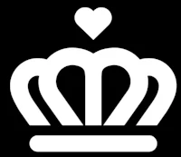 a white crown with a heart on it