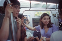 a group of people on a subway