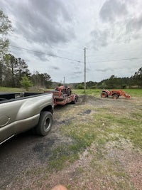 a truck is parked on the side of a road