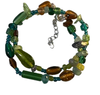 a bracelet with green, blue, and brown beads