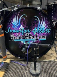 jennifer mollitt's heartland lane logo on a drum set