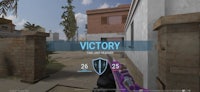 a screenshot of a video game with the word victory