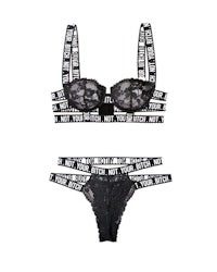 a black bra and thong set with lace