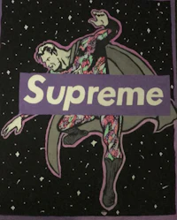 a supreme logo on a purple background