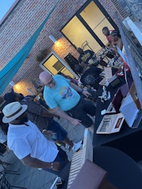 a group of people sitting around a table