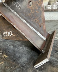 a piece of metal sitting on top of a table