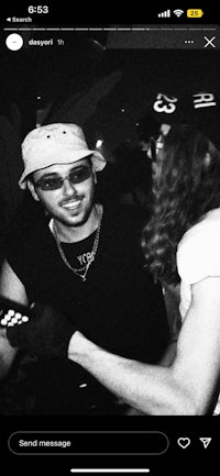 a black and white photo of a man and a woman