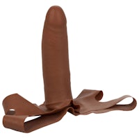 a brown dildo on a white background