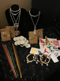 a table full of jewelry and other items