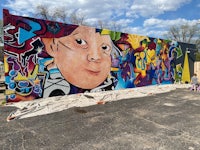 a mural painted on the side of a building