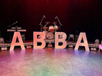 a stage with the letters abba on it
