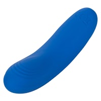 a blue plastic sex toy on a white background