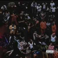 a group of people are standing around a group of people