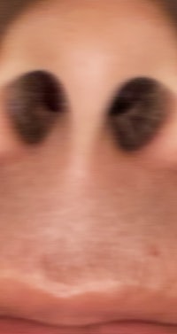 a close up of a person's nose