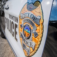 a city of bronson police car is parked in a parking lot