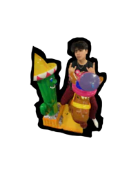 a boy is standing on top of a large inflatable toy
