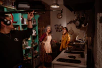 two women standing in a kitchen