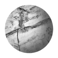 a black and white photo of a circle with a crack in it